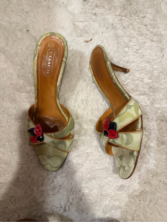 Coach Shoes - COACH Light Green Signature Mules with Red Butterfly Accent